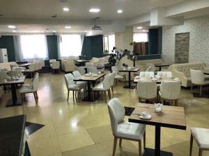 Restoran või mõni muu söögikoht majutusasutuses Guide Hotel