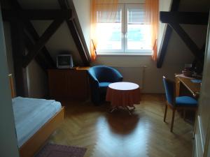 Voodi või voodid majutusasutuse Gästehaus Einzinger toas