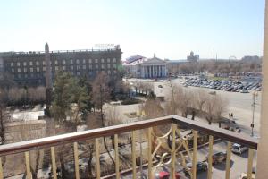 a view of a parking lot from a balcony at INTOURIST Hotel in Volgograd