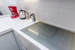 Kuchyň nebo kuchyňský kout v ubytování Elegant House Via Pia