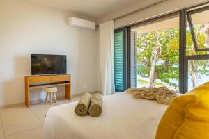 Voodi või voodid majutusasutuse Manta Cove by Horizon Holidays toas