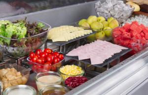 a bunch of different types of food in a refrigerator at Campanile Shanghai Huaihai in Shanghai