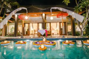 Bazén v ubytování Purana Suite Ubud nebo v jeho okolí