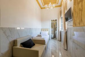 TV a/nebo společenská místnost v ubytování Olivia Luxury Rooms + 27 fotografií