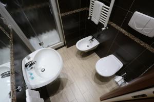 Koupelna v ubytování Hotel Europa