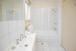 Vannituba majutusasutuses Hawthorn Gardens Serviced Apartments