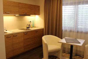 Kuchyňa alebo kuchynka v ubytovaní Apartments 461