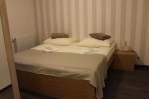 Posteľ alebo postele v izbe v ubytovaní Apartments 461