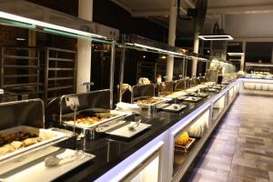 a buffet line with many plates of food at Latanya Hotel Ankara in Ankara