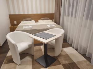 Posteľ alebo postele v izbe v ubytovaní Apartments 461