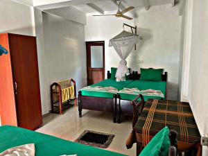 Ένα ή περισσότερα κρεβάτια σε δωμάτιο στο Casalanka Hotel