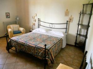 Ένα ή περισσότερα κρεβάτια σε δωμάτιο στο Agriturismo Il Sole Verde
