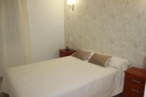 Postel nebo postele na pokoji v ubytování Apartamento Oasis - Deniasol
