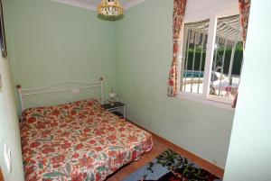Postel nebo postele na pokoji v ubytování Villa Bugamvilla - Deniasol