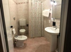 Koupelna v ubytování Hotel San Carlo