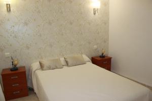 Postel nebo postele na pokoji v ubytování Apartamento Oasis - Deniasol + 27 fotografií
