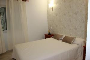 Postel nebo postele na pokoji v ubytování Apartamento Oasis - Deniasol