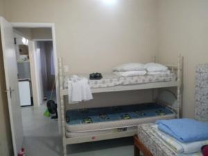 Uma ou mais camas em beliche em um quarto em Casa cassino