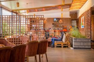 Posezení v ubytování Maple Inn Hotel