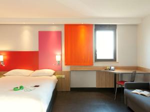 Postel nebo postele na pokoji v ubytování ibis Styles Romans-Valence Gare TGV + 37 fotografií