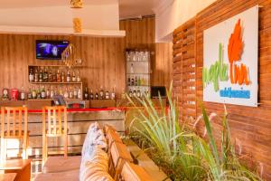 TV a/nebo společenská místnost v ubytování Maple Inn Hotel