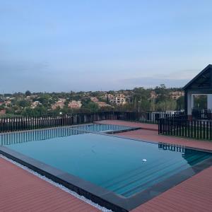 a large swimming pool on top of a house at Canvas Luxury Apartments in Johannesburg
