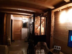 a hallway of a house with a room with a door at "NAMASTE" Chambre zen au calme in Saint-Jean-d'Aulps +24 photos