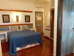 Un ou plusieurs lits dans un hébergement de l'établissement Casa do Rio / Tavira Inn - Adults Only