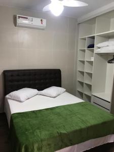 Krevet ili kreveti u jedinici u okviru objekta Casa - Próximo a UFSC e Centro - 5KM #