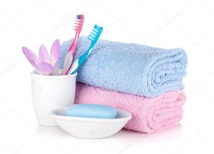 a pile of towels and toothbrushes in a cup at No 1 Leitrim Road in Carrick on Shannon