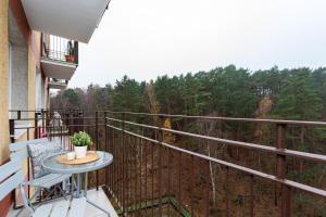 Balkon lub taras w obiekcie Apartament Forest - Parking - Praia Apartments Sopot Aquapark