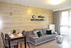 Posezení v ubytování Apartamenty Sun&Fun Rezydencja Parkowa Nadrzeczna 3D i 3E -blisko centrum, dworca PKP w otoczeniu zieleni