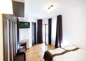 Posteľ alebo postele v izbe v ubytovaní GORHouse Hotel