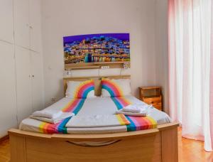 Łóżko lub łóżka w pokoju w obiekcie Cosy apartment for 4