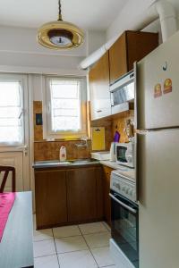 Kuchnia lub aneks kuchenny w obiekcie Cosy apartment for 4