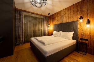 Posteľ alebo postele v izbe v ubytovaní LUVA Resorts Kappl - Chalet K