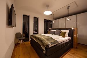 Posteľ alebo postele v izbe v ubytovaní LUVA Resorts Kappl - Chalet K