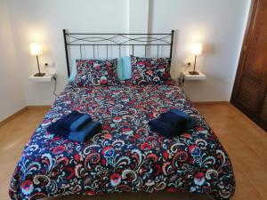 Ein Bett oder Betten in einem Zimmer der Unterkunft Mirador de Alegranza