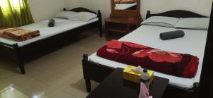 Tempat tidur dalam kamar di Hotel As Shams International