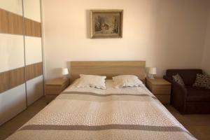 Posteľ alebo postele v izbe v ubytovaní Apartmány Malý Princ