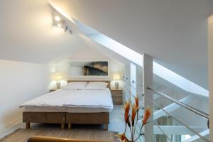 Posteľ alebo postele v izbe v ubytovaní Apartament K2