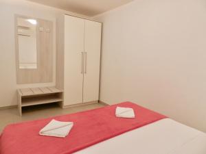 Postel nebo postele na pokoji v ubytování Diamant Apartments