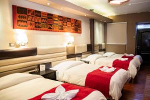 Katil atau katil-katil dalam bilik di Hotel Royal Qosqo