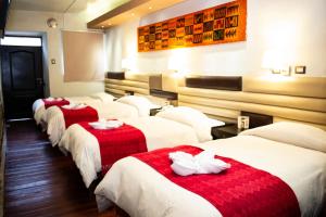 Katil atau katil-katil dalam bilik di Hotel Royal Qosqo