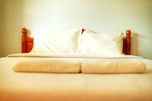 Ein Bett oder Betten in einem Zimmer der Unterkunft Tararin