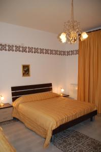 Postel nebo postele na pokoji v ubytování B&B Milù