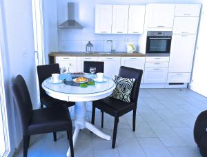 Kuchyň nebo kuchyňský kout v ubytování Diamant Apartments