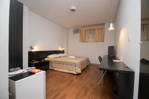 Postel nebo postele na pokoji v ubytování Hotel Bramig + 37 fotografií