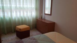 A bed or beds in a room at Can Joan