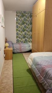 A bed or beds in a room at Can Joan